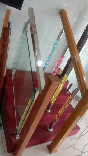 Stainless steel, wood and glass railing with crystal balusters